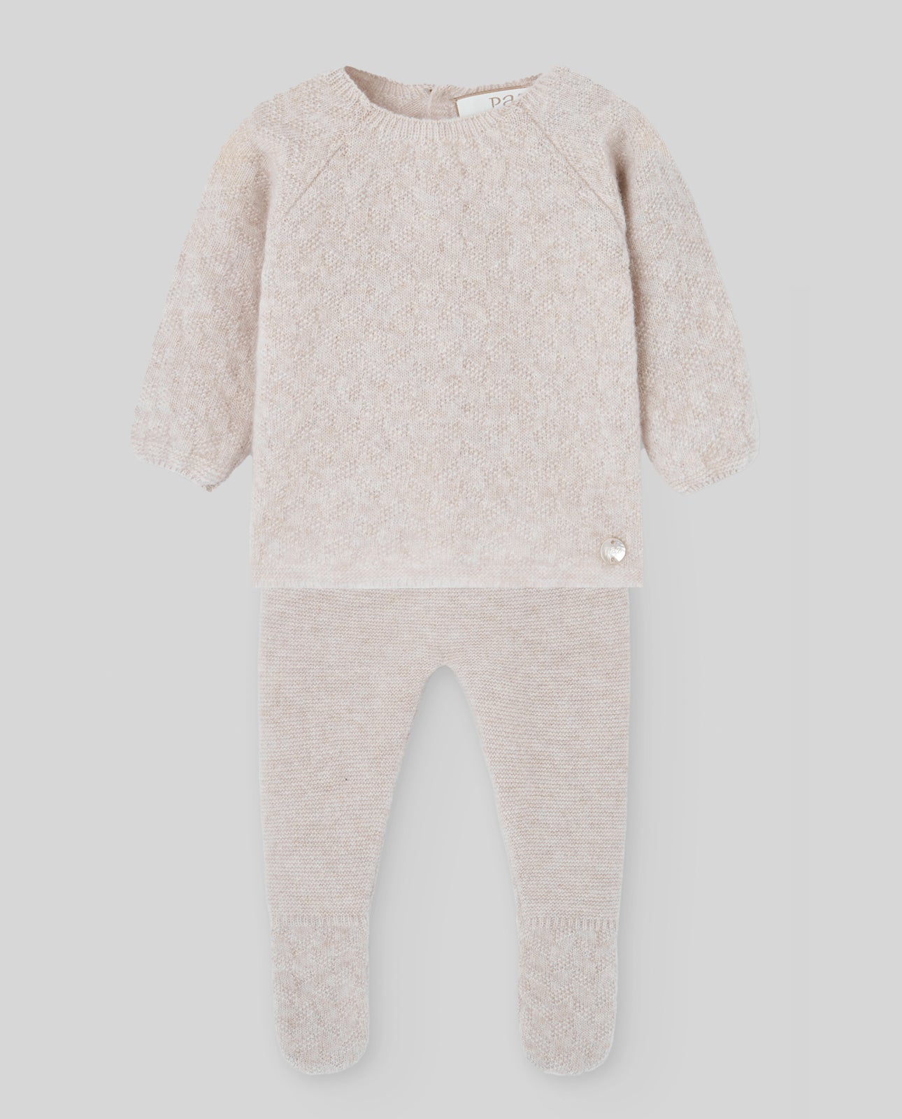 Baby outfit with long-sleeve top and pants on a light gray background
