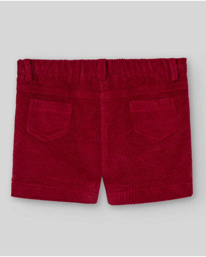 Red corduroy shorts on a light gray background