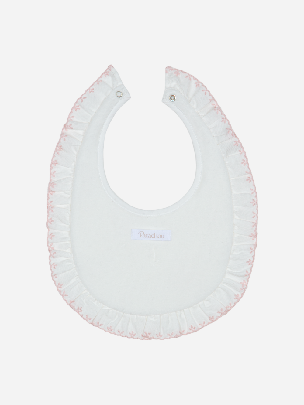 White baby bib with pink trim on a white background
