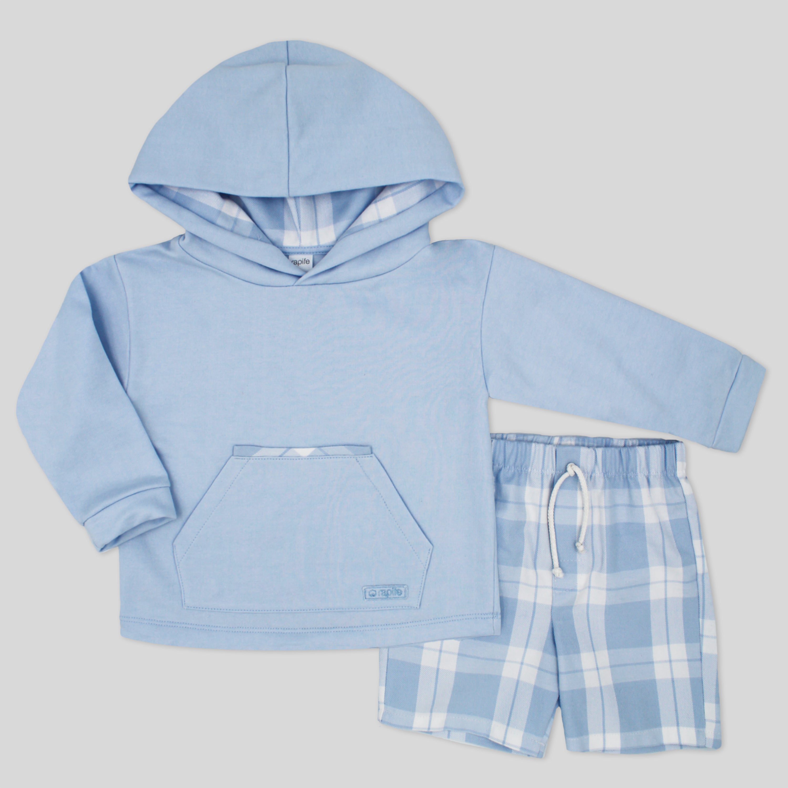 Children's blue hoodie and plaid shorts set on a light gray background