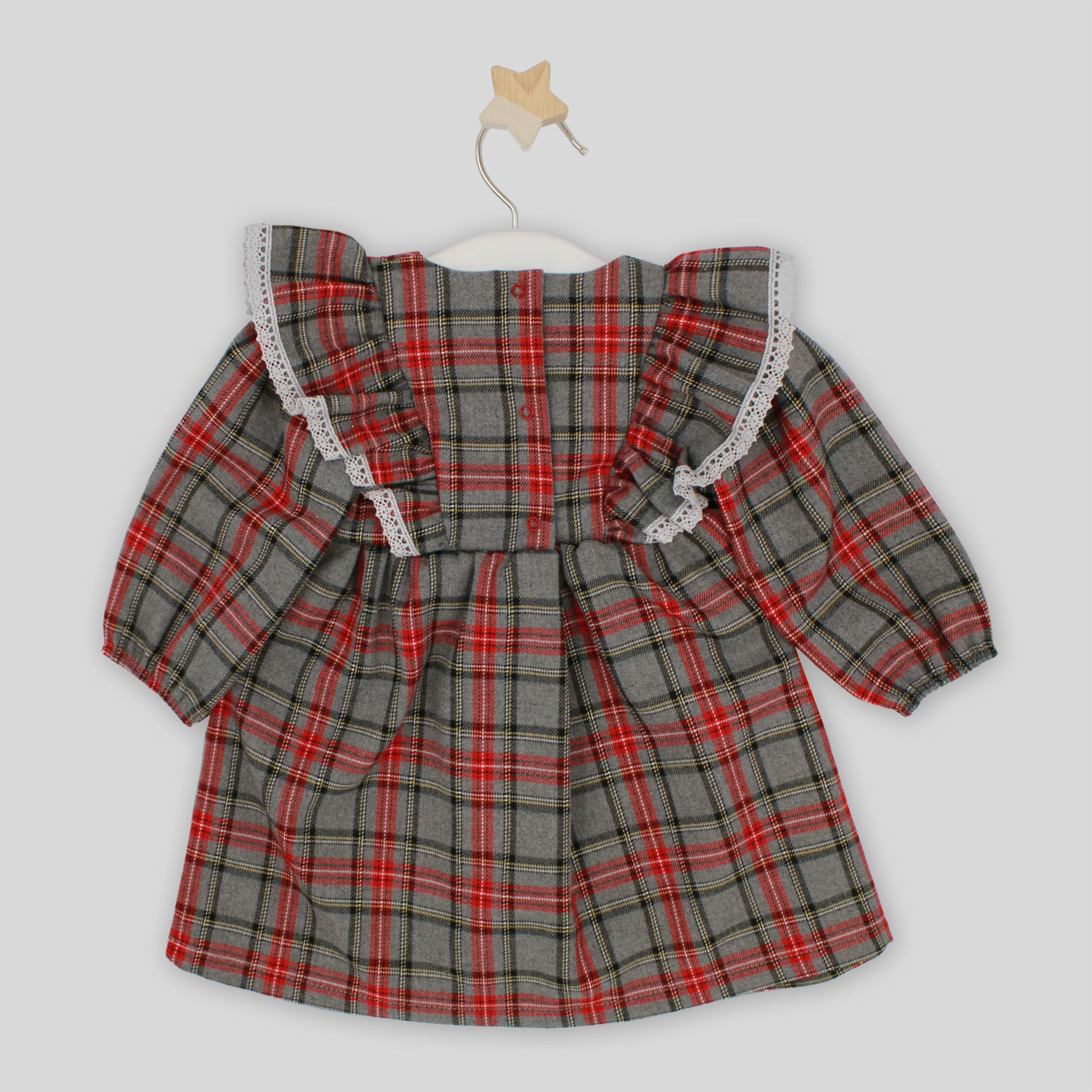 Plaid dress with ruffled sleeves on a white background