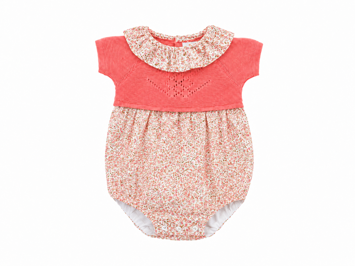 Baby romper with floral collar and bottom on a white background
