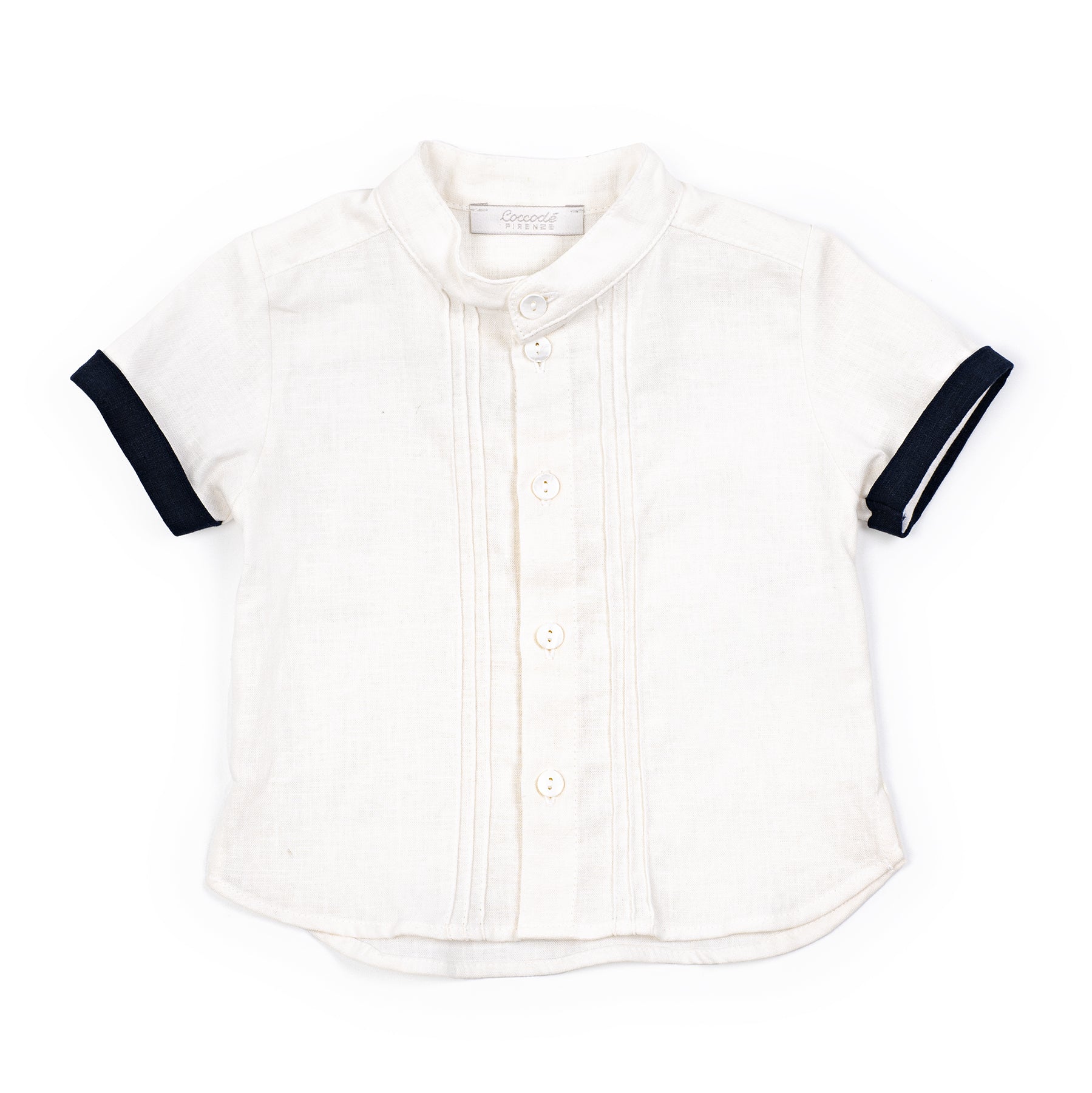 White shirt with navy accents on sleeves and collar against a white background