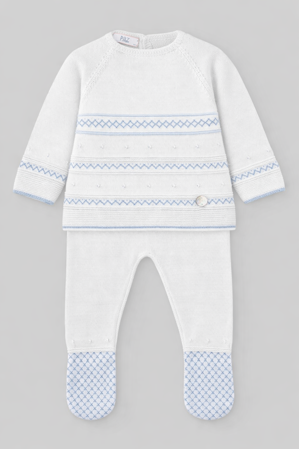 Baby outfit with white top and pants featuring blue patterns on a gray background