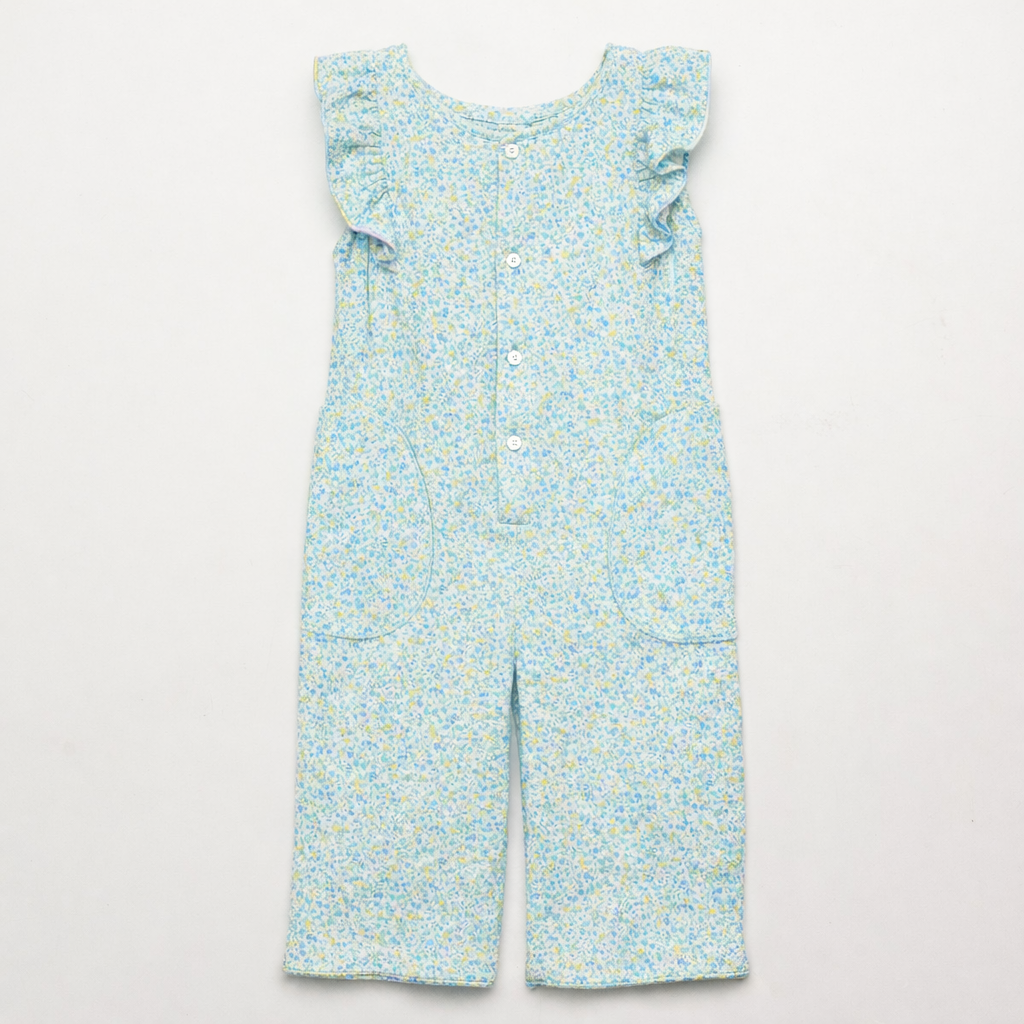 Floral-patterned jumpsuit on a light gray background