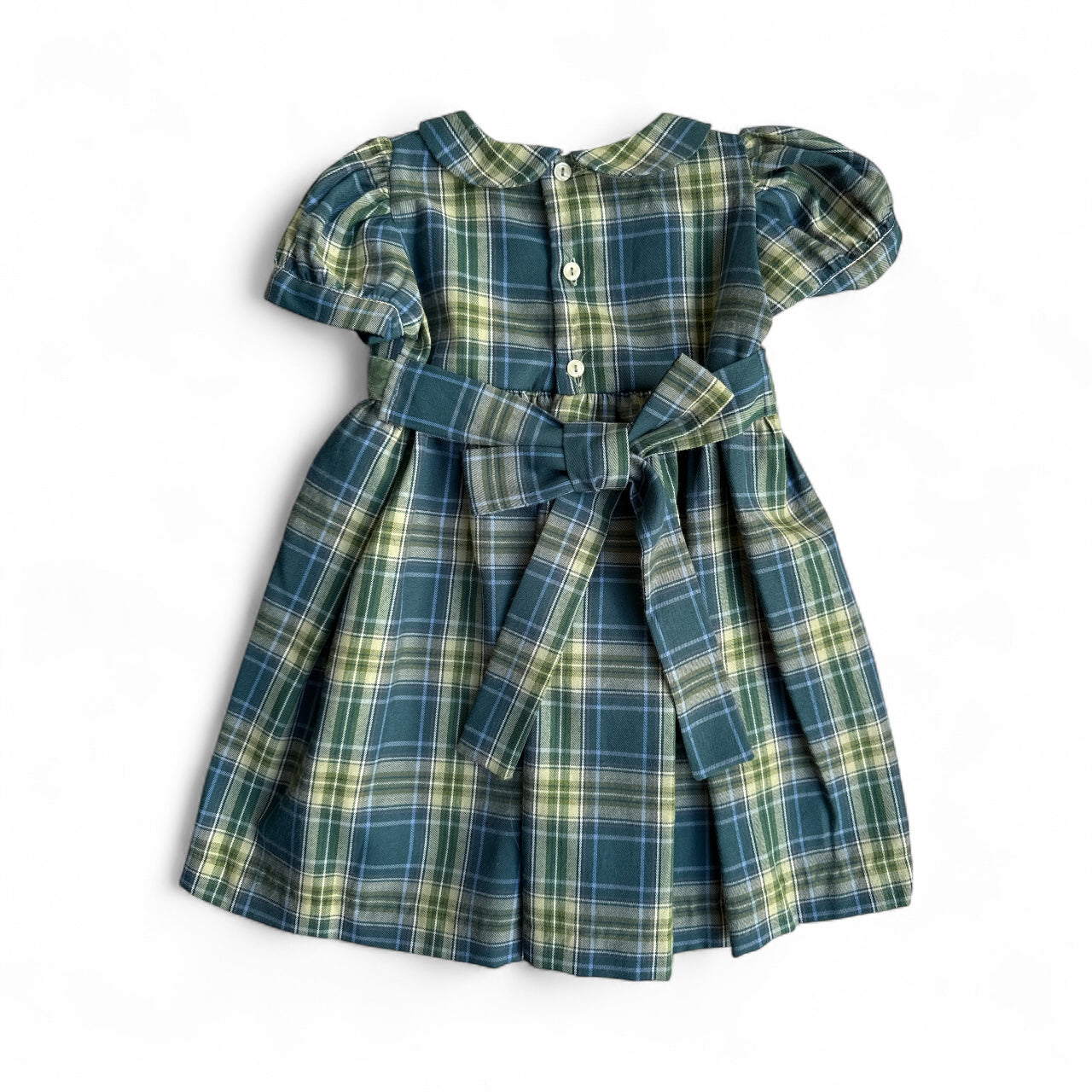 Green and blue plaid dress with puff sleeves on a white background