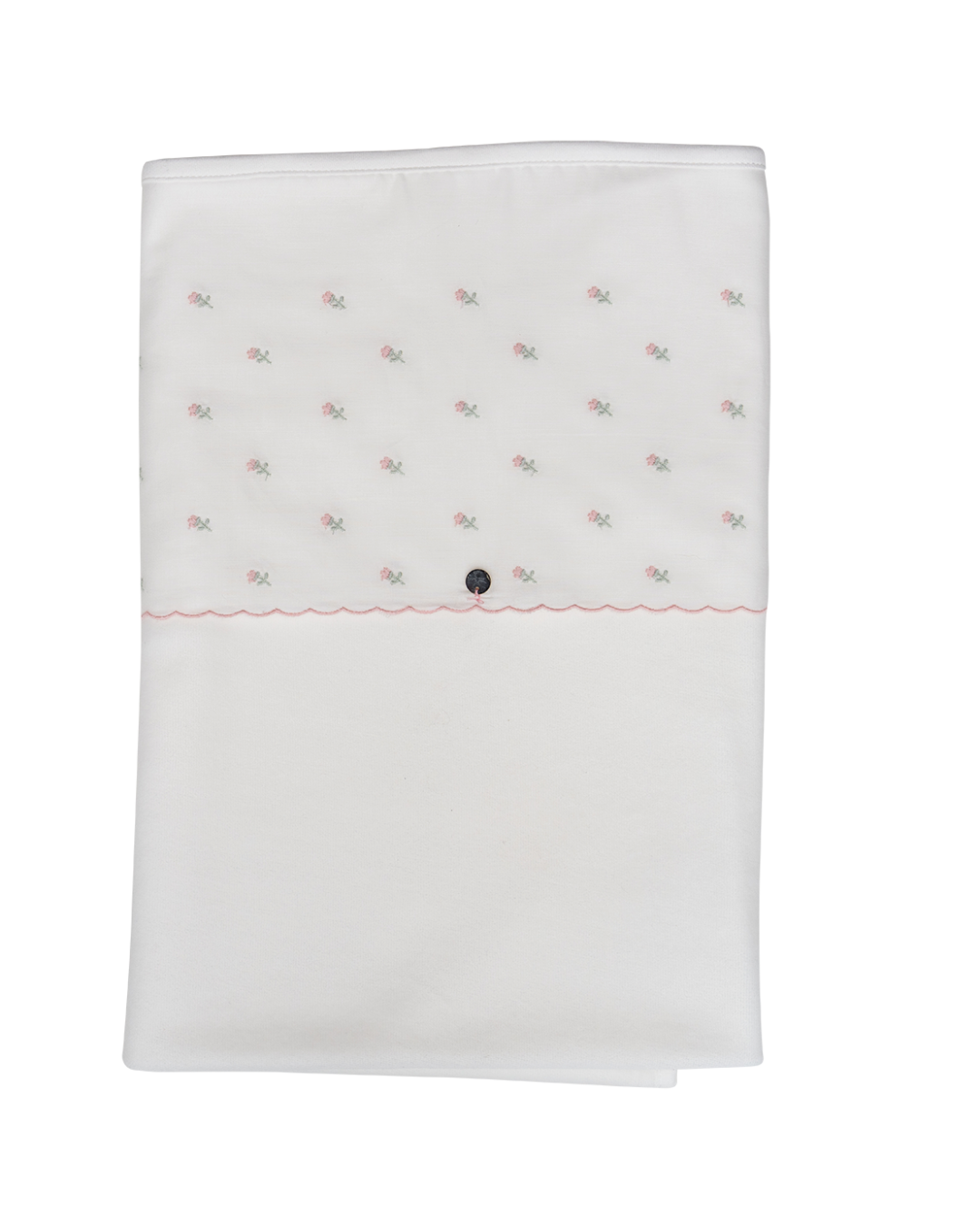 White fabric with embroidered pattern on a white background