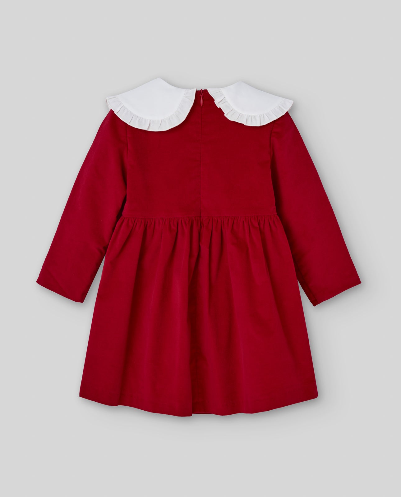 Red dress with white collar on a gray background