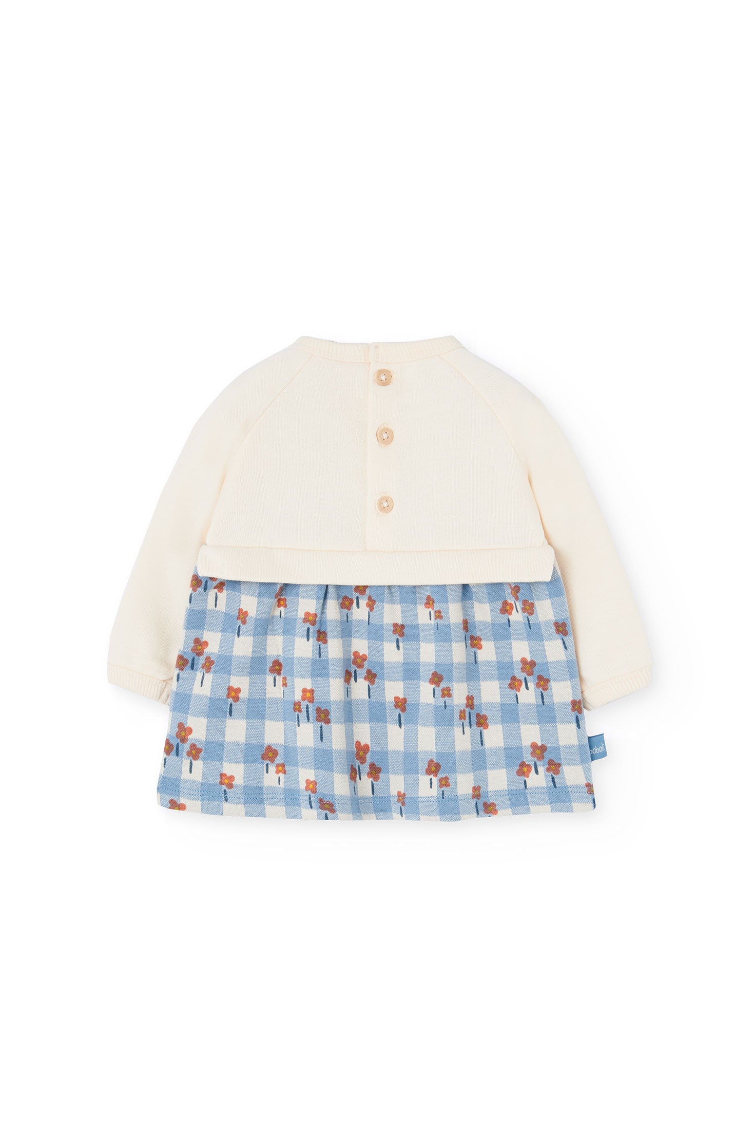 White cardigan with a blue checkered skirt on a white background