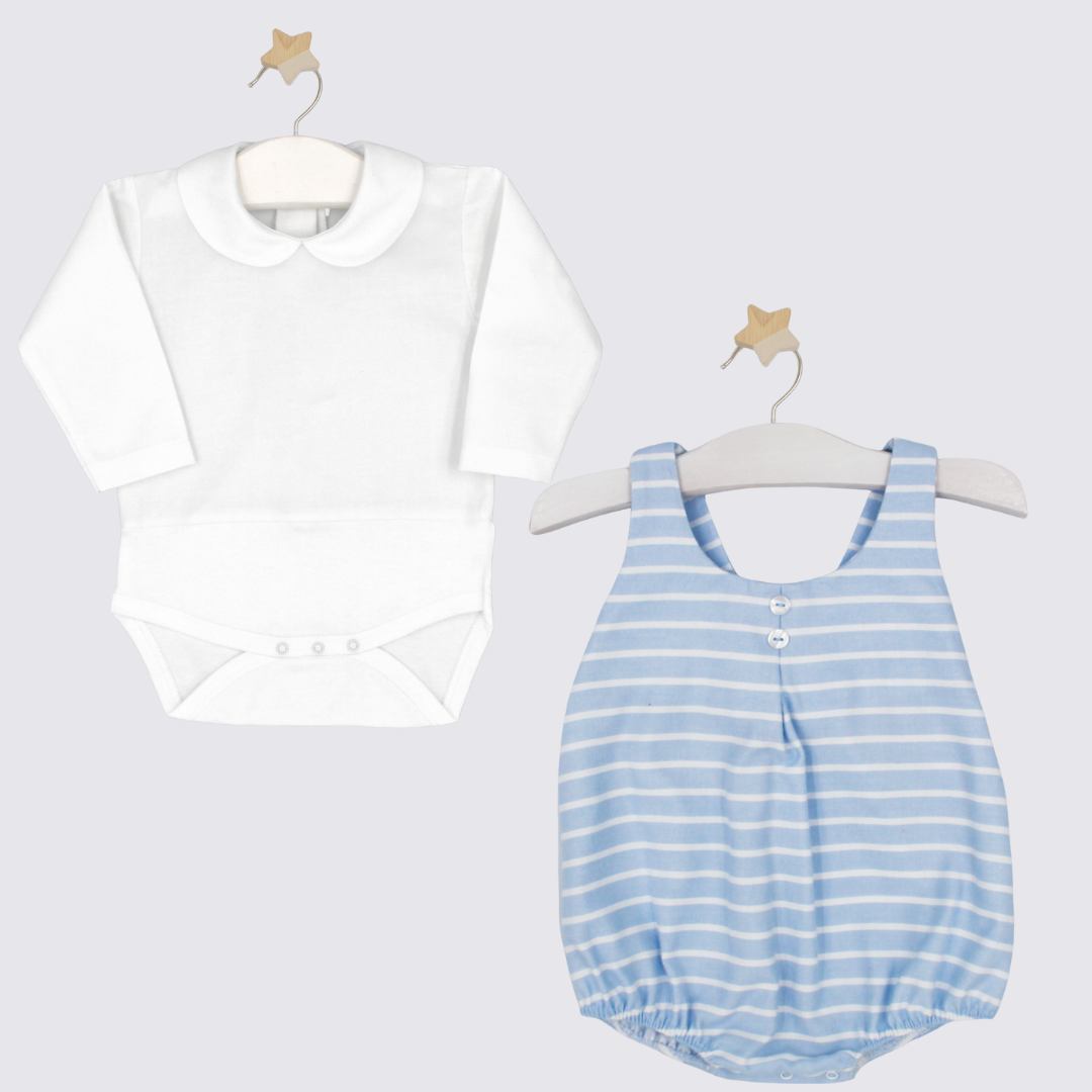White long-sleeve shirt and blue striped romper on hangers against a white background