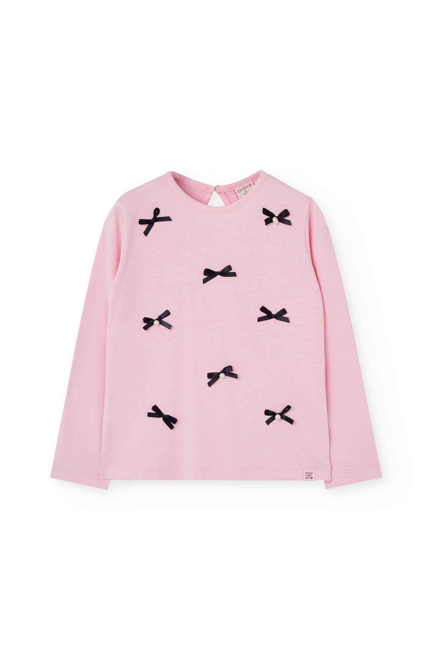 Pink long-sleeve top with black bow details on a white background