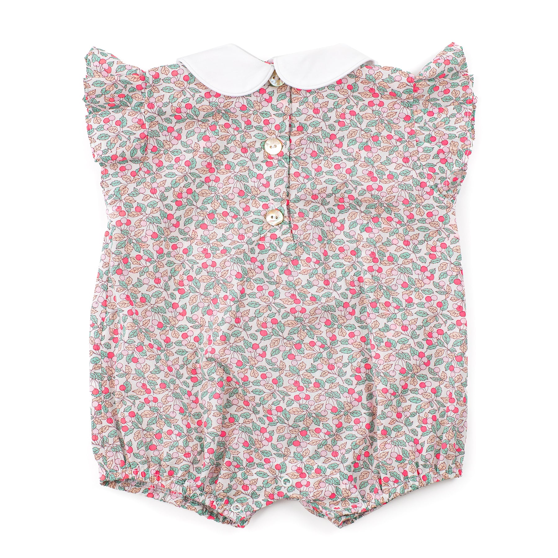 Floral baby romper with a white collar on a white background