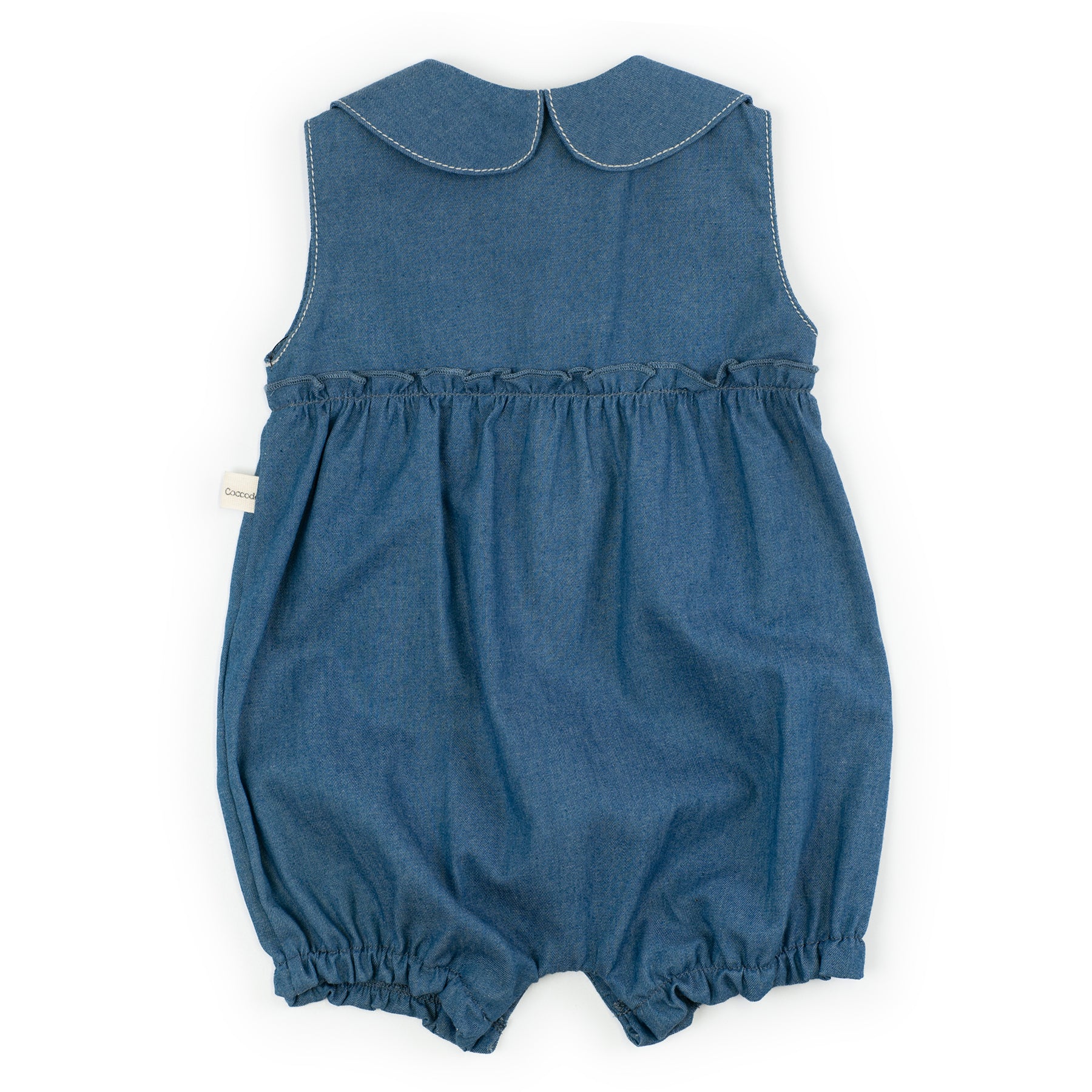 Blue denim baby romper with Peter Pan collar on a white background