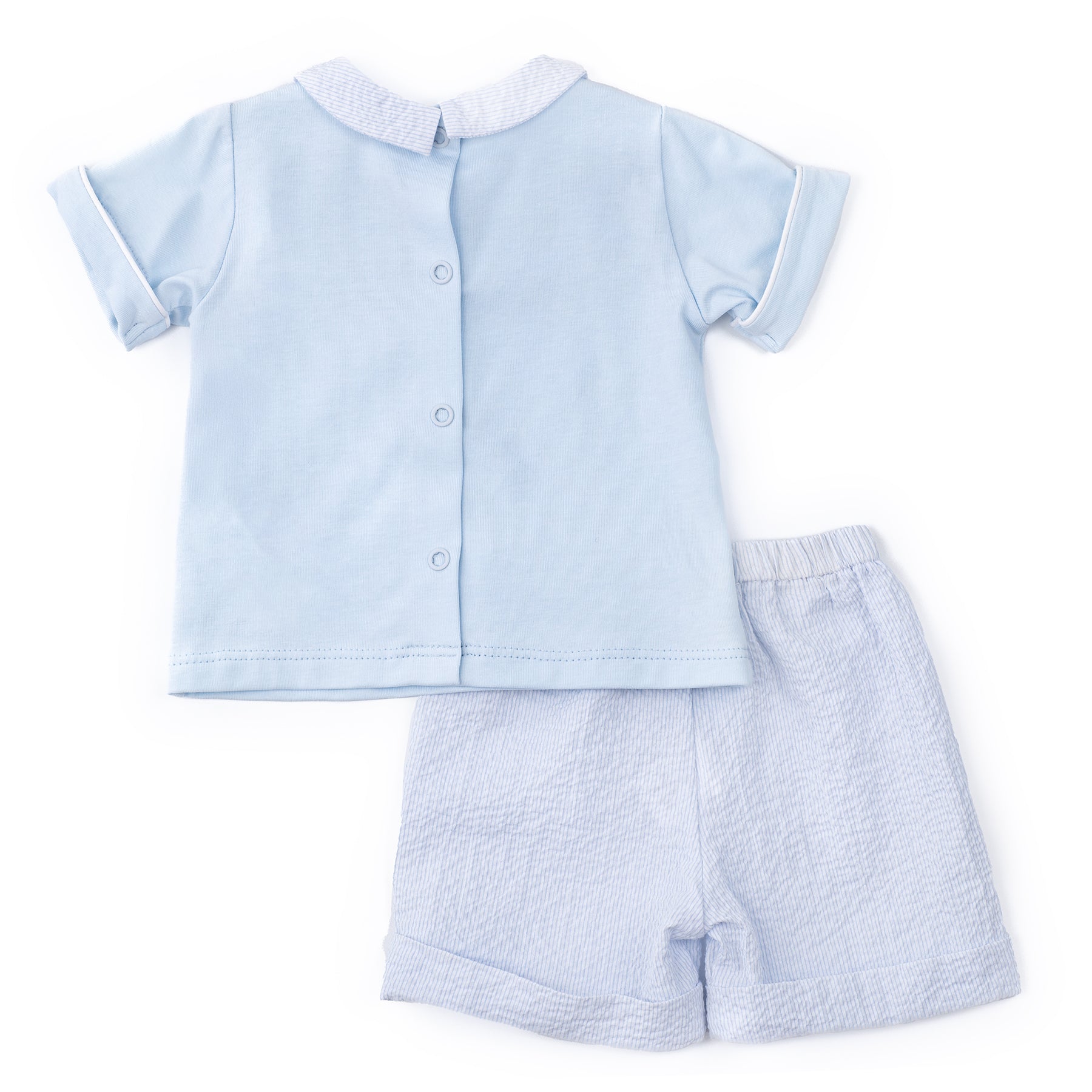 Light blue children's shirt and shorts set on a white background