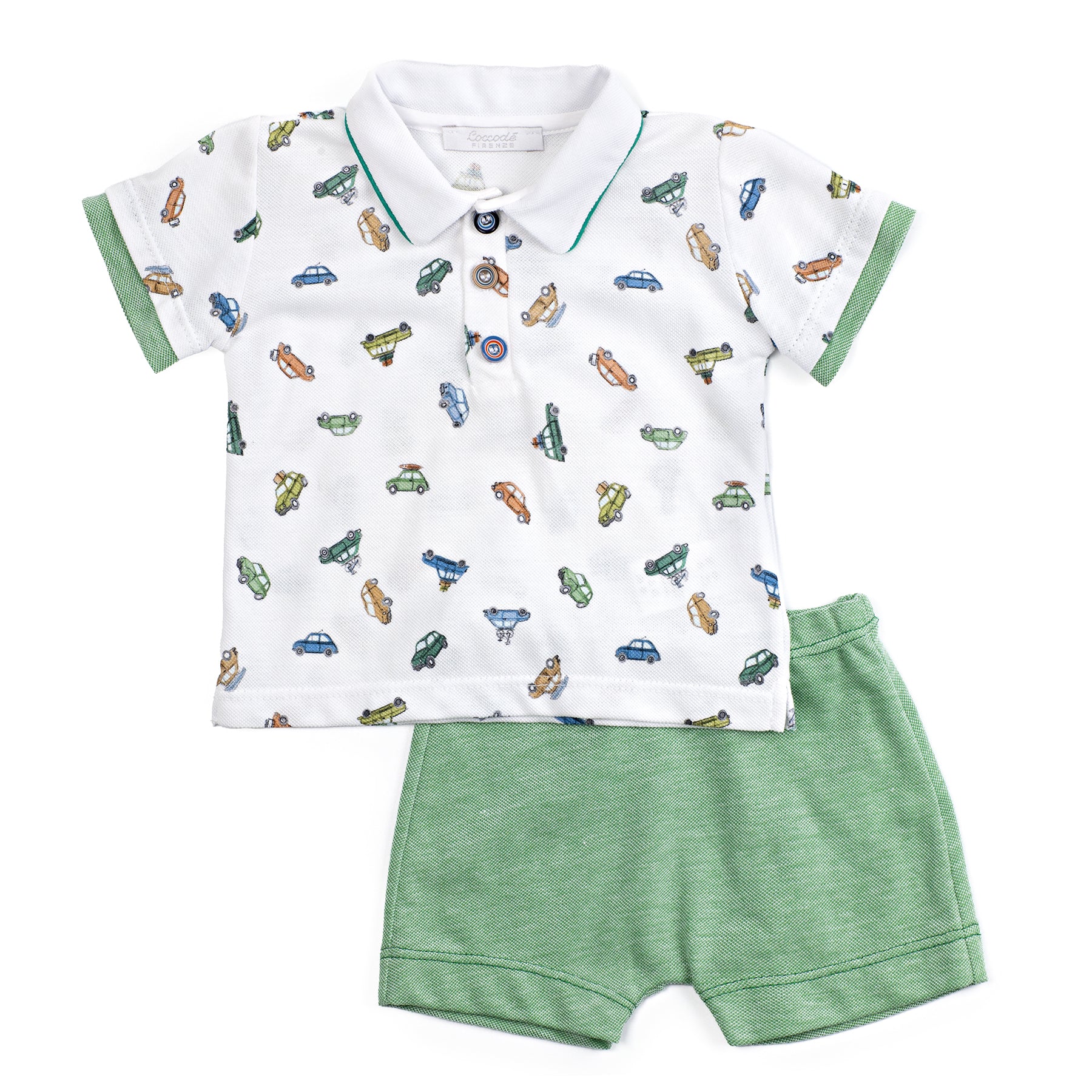 Children's outfit with a patterned shirt and green shorts on a white background