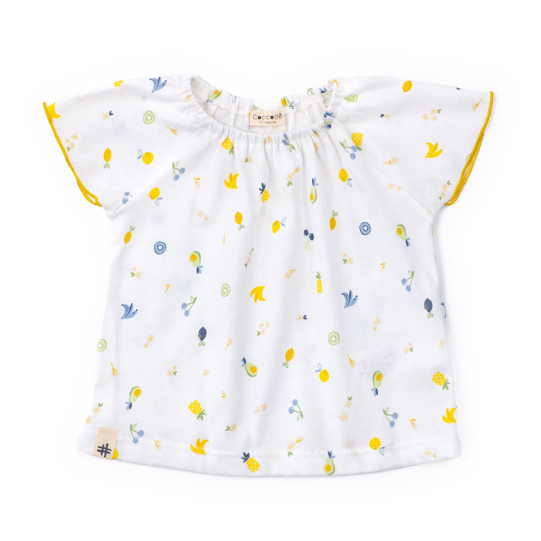 White blouse with colorful floral pattern on a white background