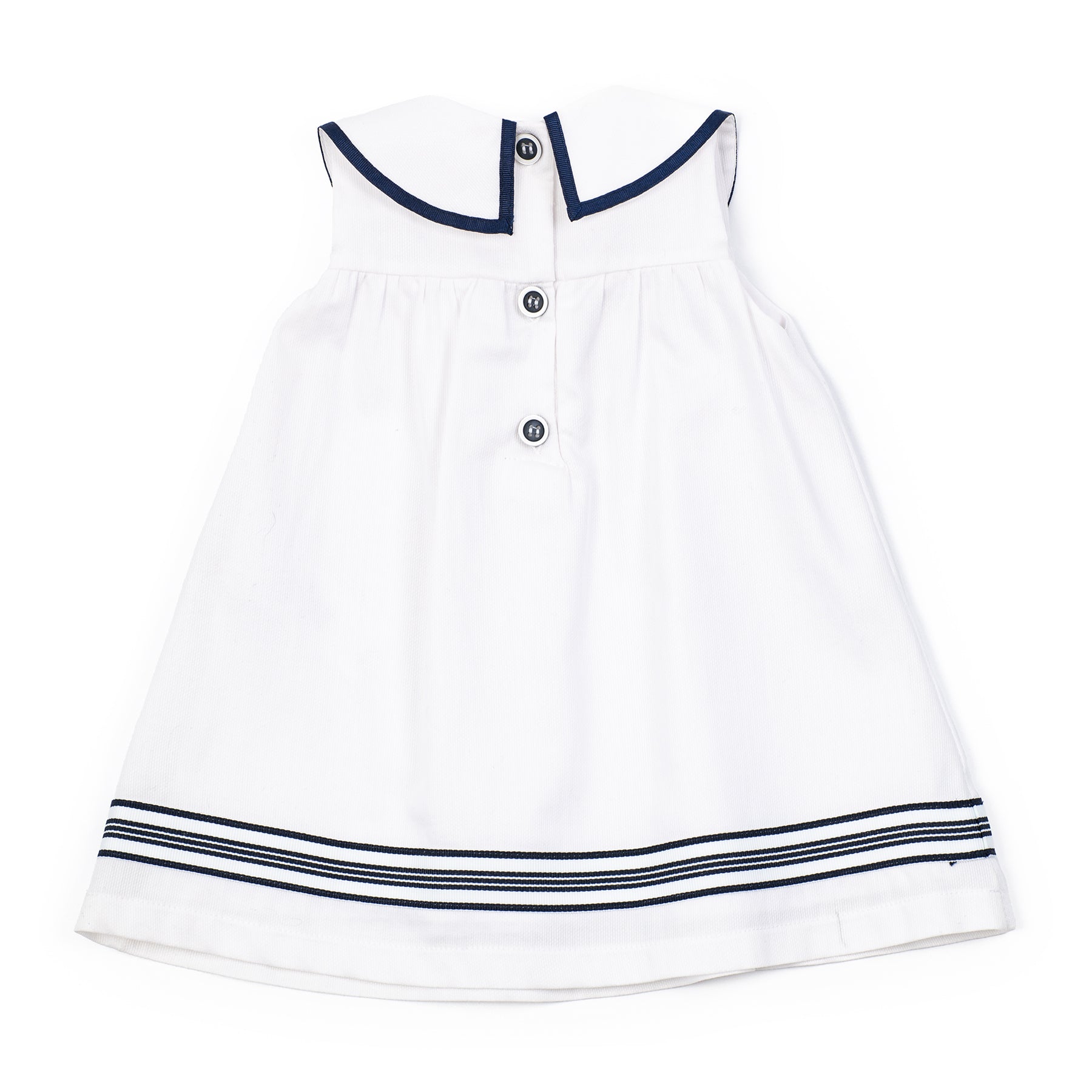 White dress with navy trim on a white background