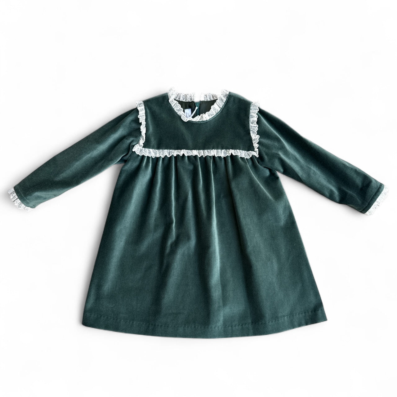 Green dress with lace trim on a white background