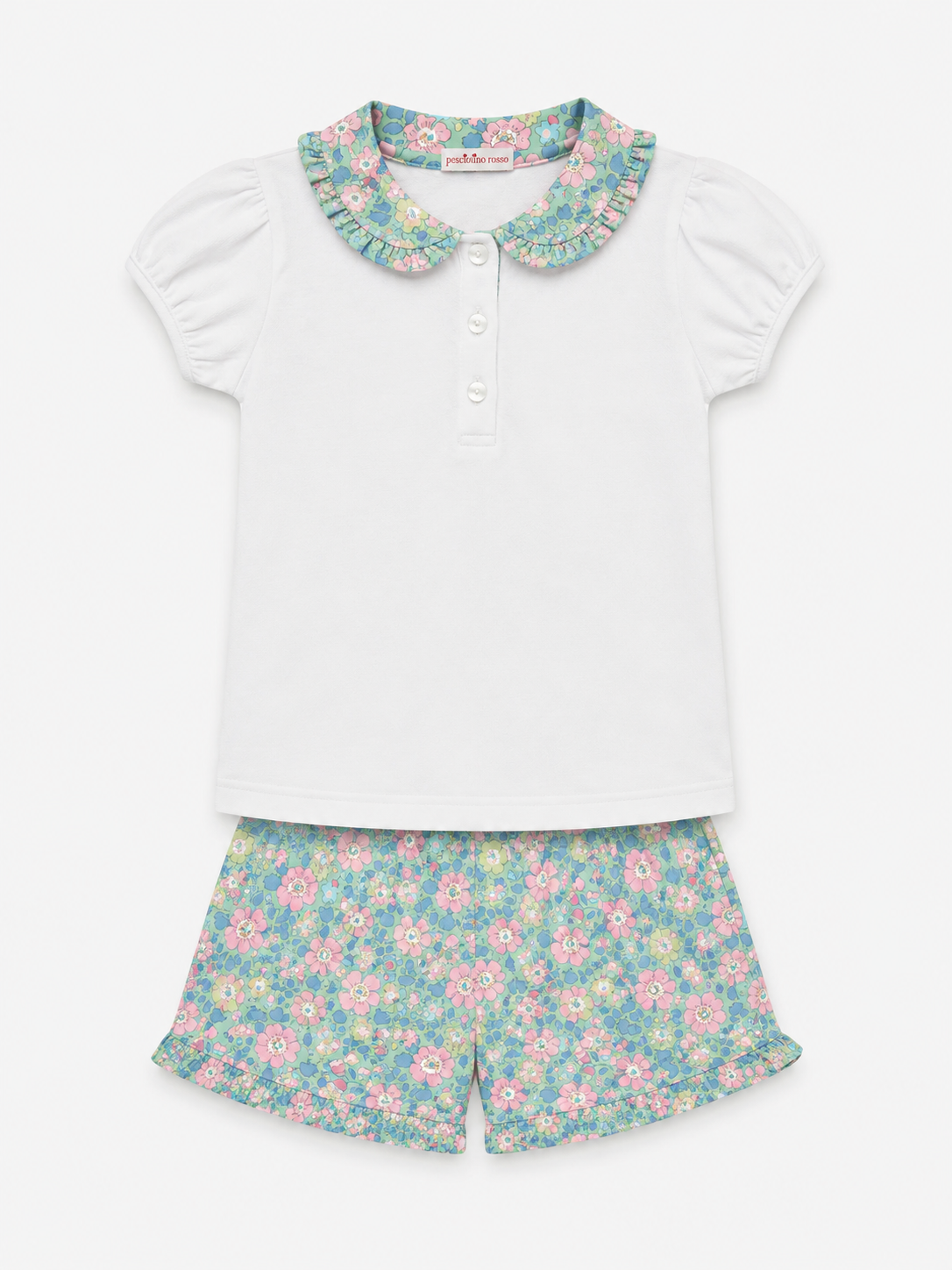 Children's outfit with floral collar and shorts on a white background
