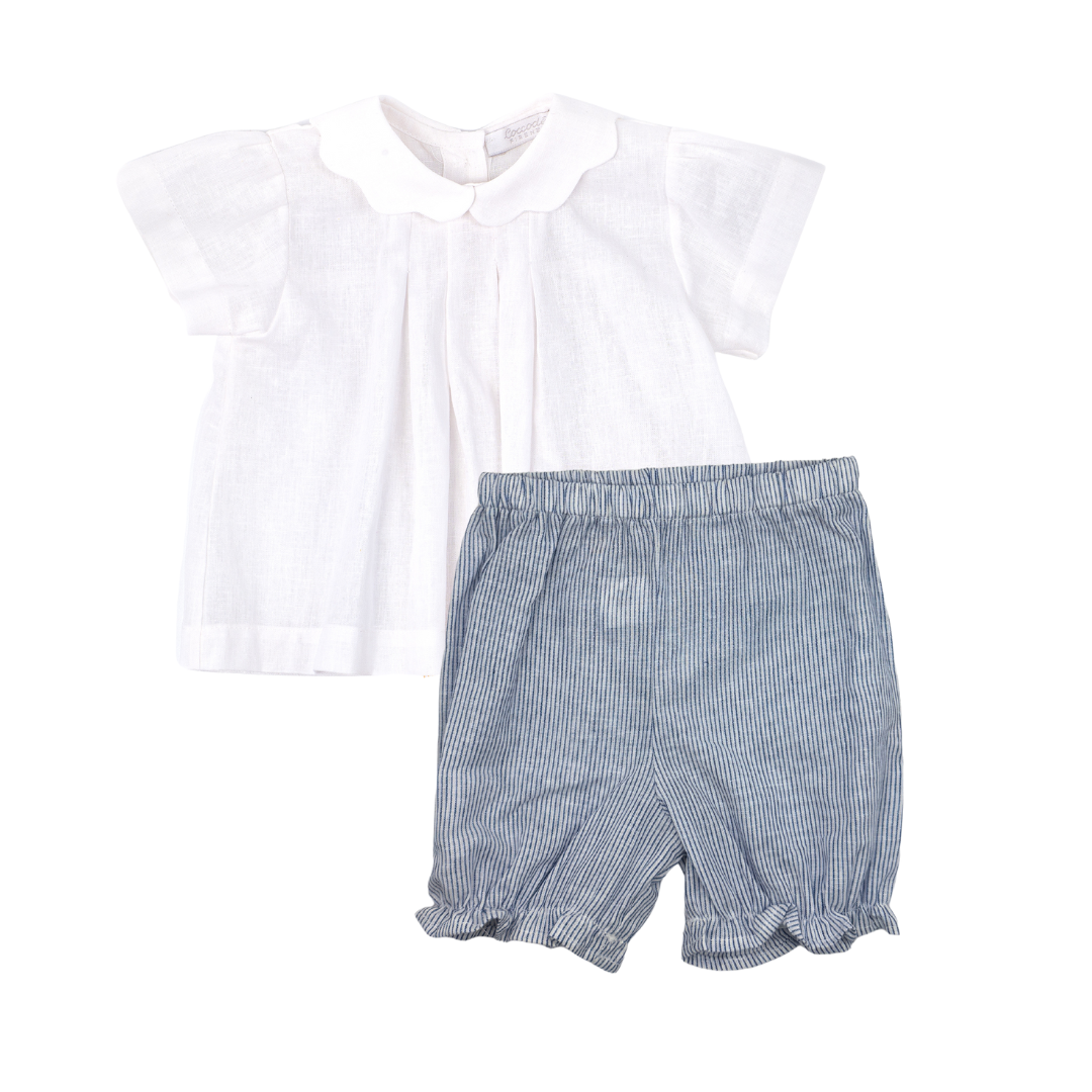 White top and blue striped shorts set on a white background