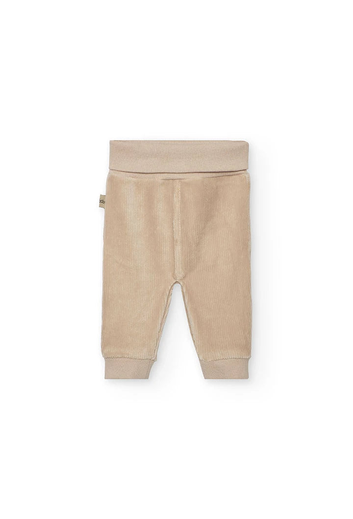 Beige baby pants on a white background